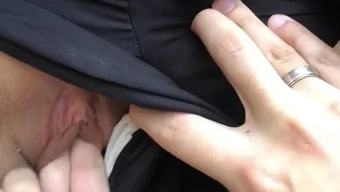 Teen girl gives herself a footjob in the park