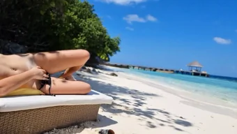 Masturbation on the beach with girl on girl action