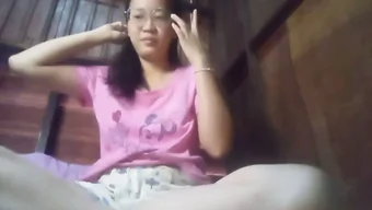 Teen Asian girl masturbates in homemade video