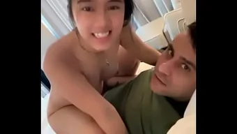 A tiny Asian chick is having fun with her boyfriend